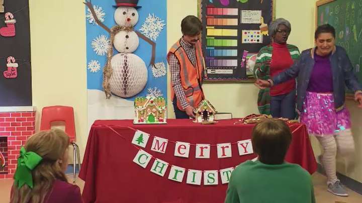 Gingerbread Competition Judged By Safety Inspector
